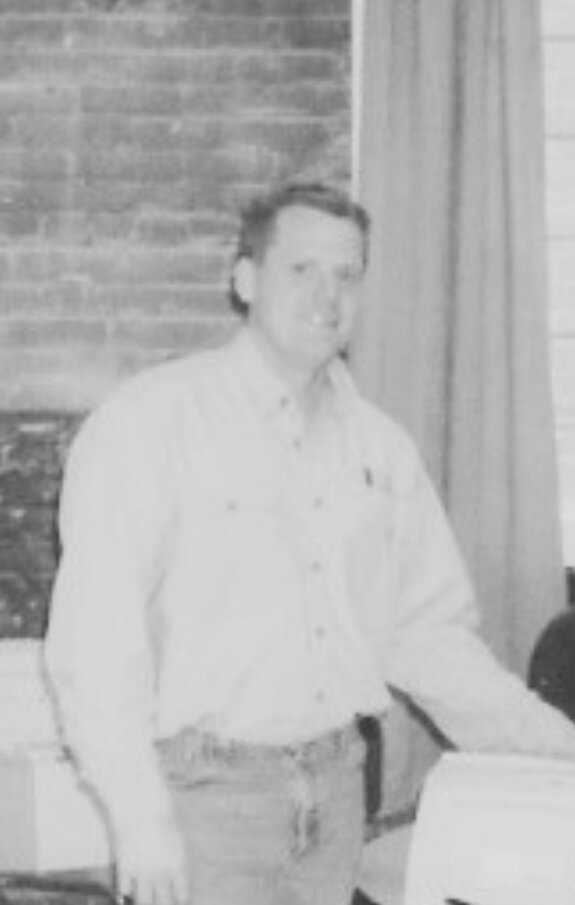 Todd Yeager beside the front desk